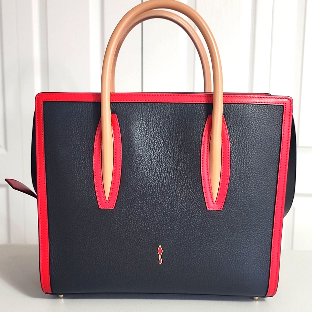 Christian Louboutin black and tan handbag.